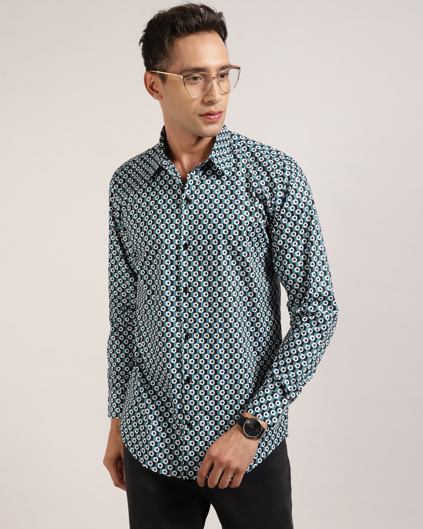 A man wearing a Monsui cotton geometric printed shirt