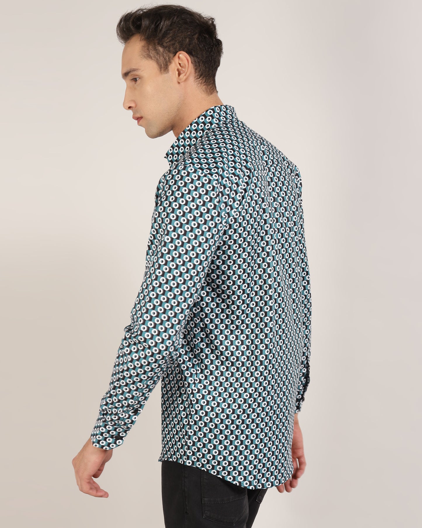 Close-up of the intricate geometric print on a Monsui cotton shirt