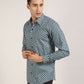 A stylish man in a cotton geometric printed shirt by Monsui