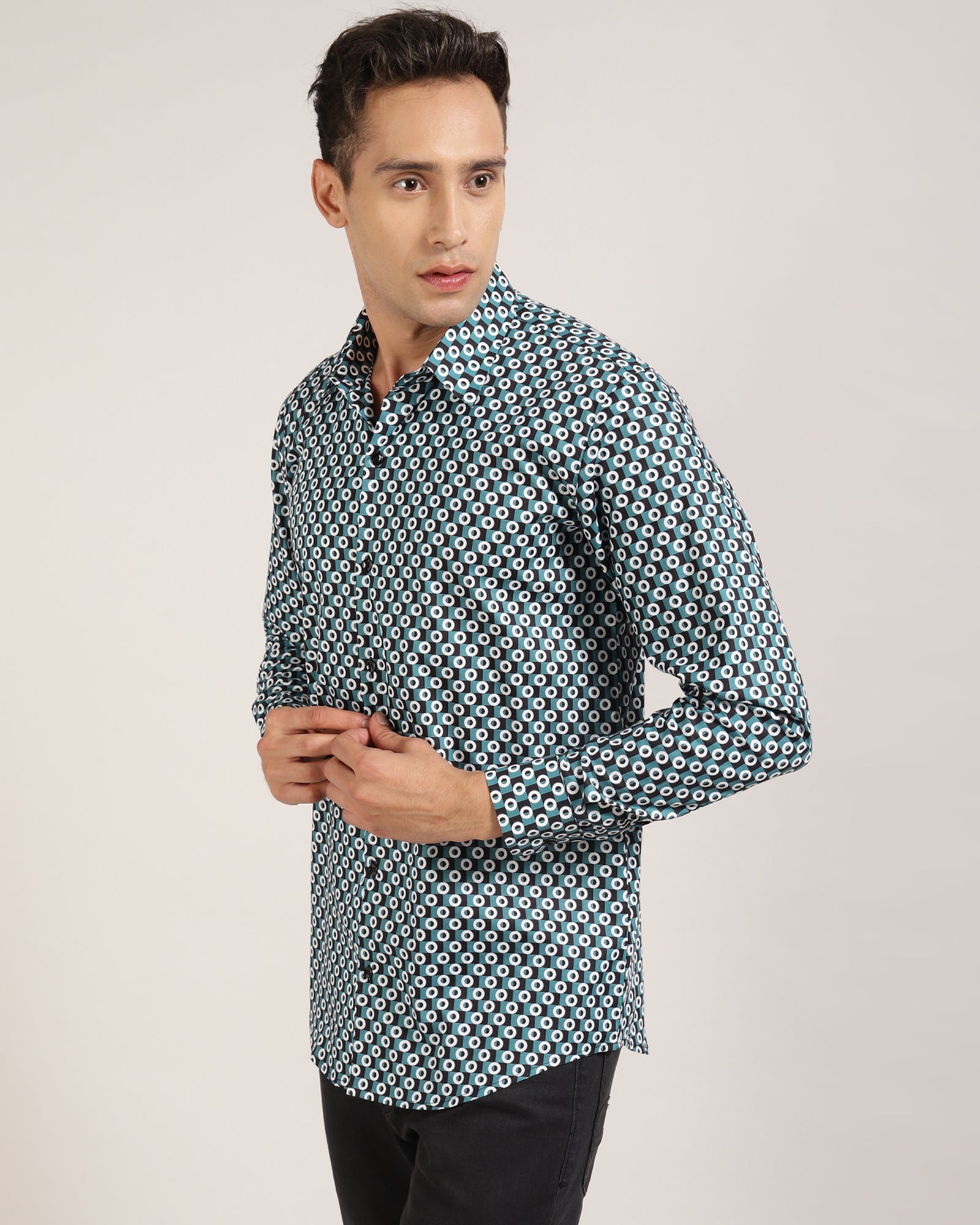 A stylish man in a cotton geometric printed shirt by Monsui