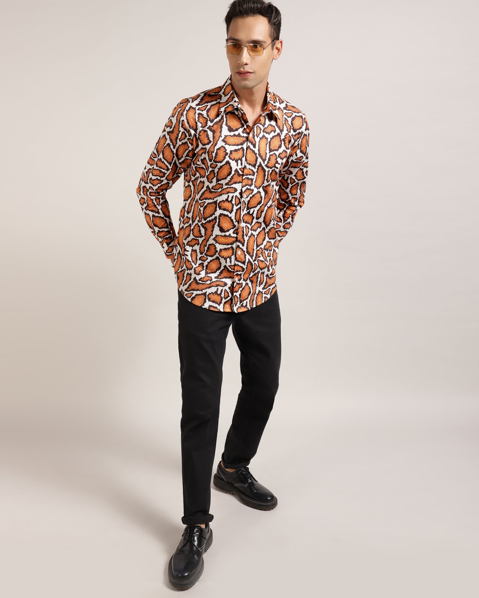 A bold and eye-catching men's shirt with a tiger stripe pattern, designed by Monsui to make a statement