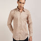 A man wearing a beige geometric printed 100% cotton shirt