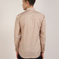 Beige geometric pattern on a shirt