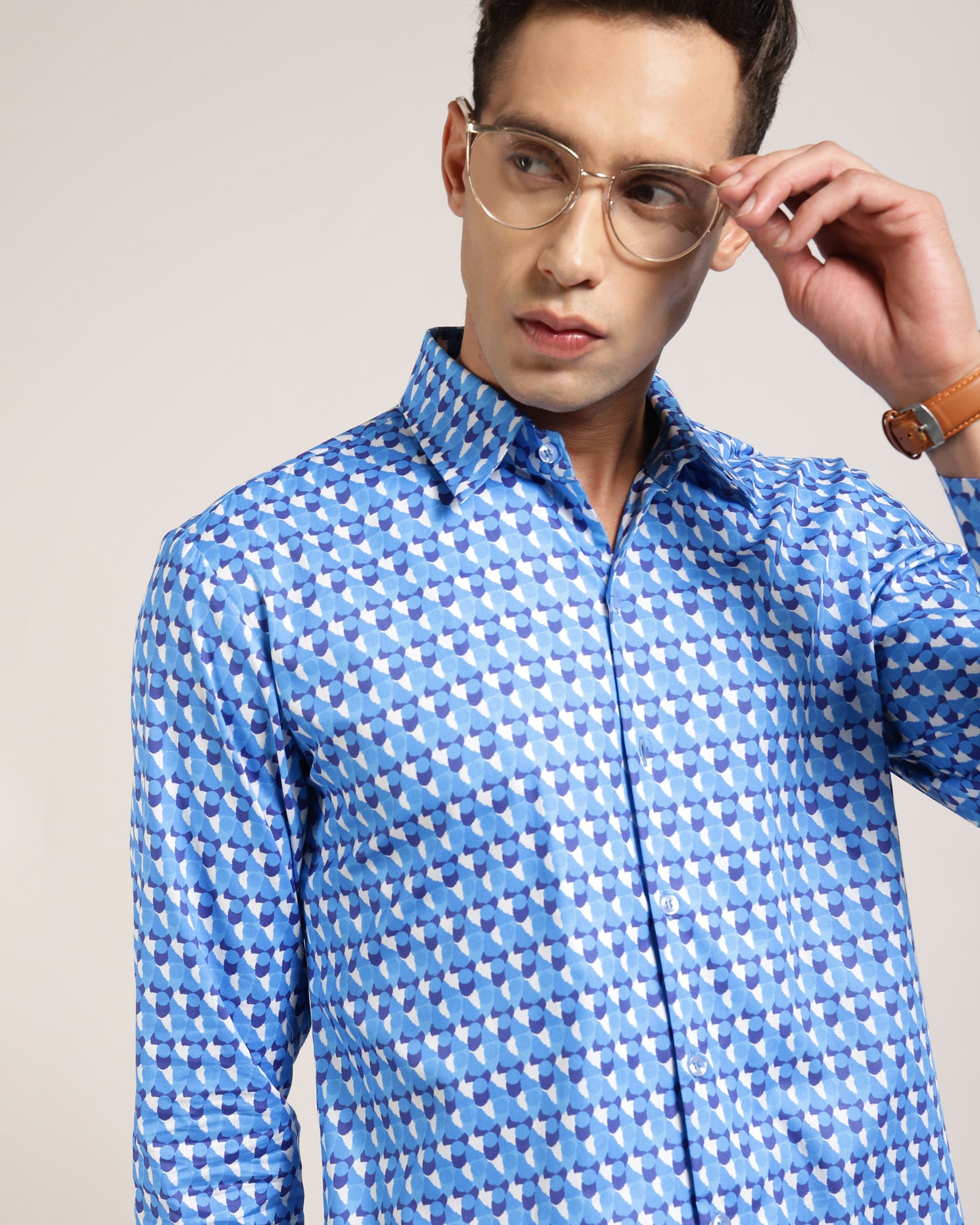 Upgrade your wardrobe with a white and light blue printed shirt from Monsui