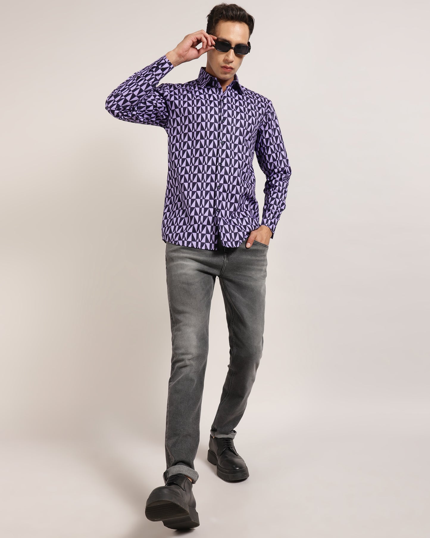 Upgrade your wardrobe with this vibrant purple and black geometric shirt from Monsui