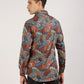 Side view of the multi-color abstract printed shirt, displaying the relaxed fit.