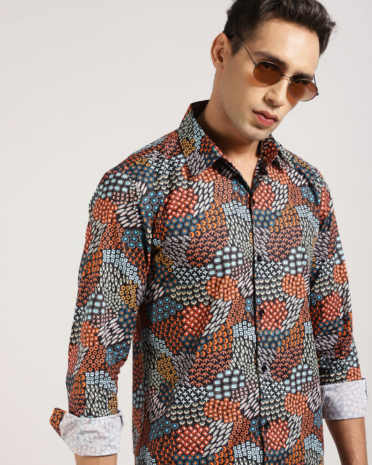 Man wearing the multi-color abstract printed shirt, looking stylish